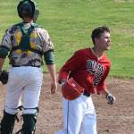 Peninsula Oilers pinchhitter Bobby Goodloe celebrates after scoring the winning run Sunday, July 7, 2019, against the Mat-Su Miners at Coral Seymour Memorial Park in Kenai, Alaska. (Photo by Joey Klecka/Peninsula Clarion)