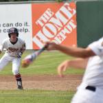 Twins baserunner Mose Hayes keeps an eye on teammate Seth Adkins Monday, July 8, 2019, against West at Coral Seymour Memorial Park in Kenai, Alaska. (Photo by Joey Klecka/Peninsula Clarion)