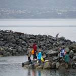Photo by Michael Armstrong/Homer News                                Anglers fish on July 15, 2019, at the mouth of the Nick Dudiak Fishing Lagoon in Homer, Alaska. Rain fell over the weekend after a weeks-long stretch of sunny weather.