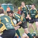 Dan Balmer of Kenai Wolfpack Rugby carries the ball Saturday, July 20, 2019, during the Kenai Dipnet Fest Rugby 10s Tournament in Kenai. Balmer is backed by teammates, from left to right, Will Steffe, Austin Danielson and Clay Beck. (Photo by Jeff Helminiak/Peninsula Clarion)