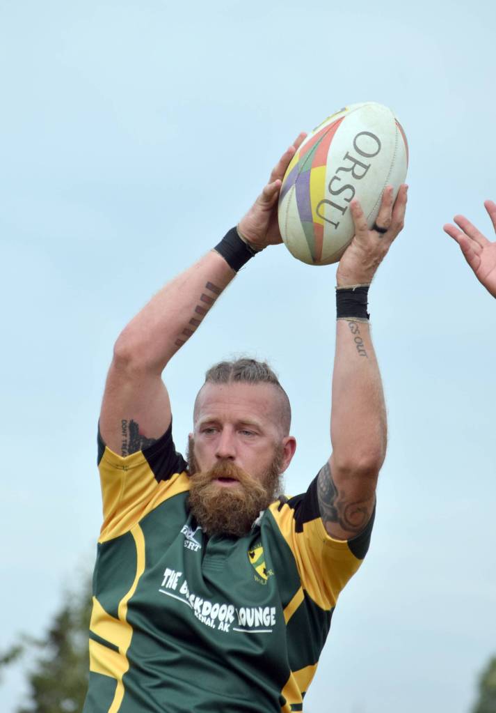 Jason Fitzgerald skies for the ball Saturday, July 20, 2019, at the Kenai Dipnet Fest Rugby 10s Tournament in Kenai. (Photo by Jeff Helminiak/Peninsula Clarion)