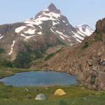 A pair of tents sits at the Infinity Pools above the Tutka Backdoor Trail on July 9, 2019. (Photo by Jeff Helminiak/Peninsula Clarion)
