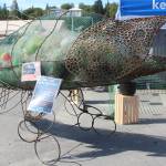 Sally, a salmon statue in front of the Kenai Watershed tent, serves as a reminder to passersby about the importance of keeping the oceans clean of fishing line on Friday, Aug. 2, 2019 at Salmonfest in Ninilchik, Alaska. (Photo by Megan Pacer/Homer News)