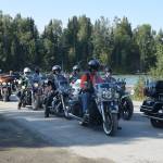Bikers from the American Legion prepare to escort the soldiers from the Wounded Warriors Fishing Trip at Centennial Park in Soldotna, Alaska on Aug. 9, 2019. (Photo by Brian Mazurek)