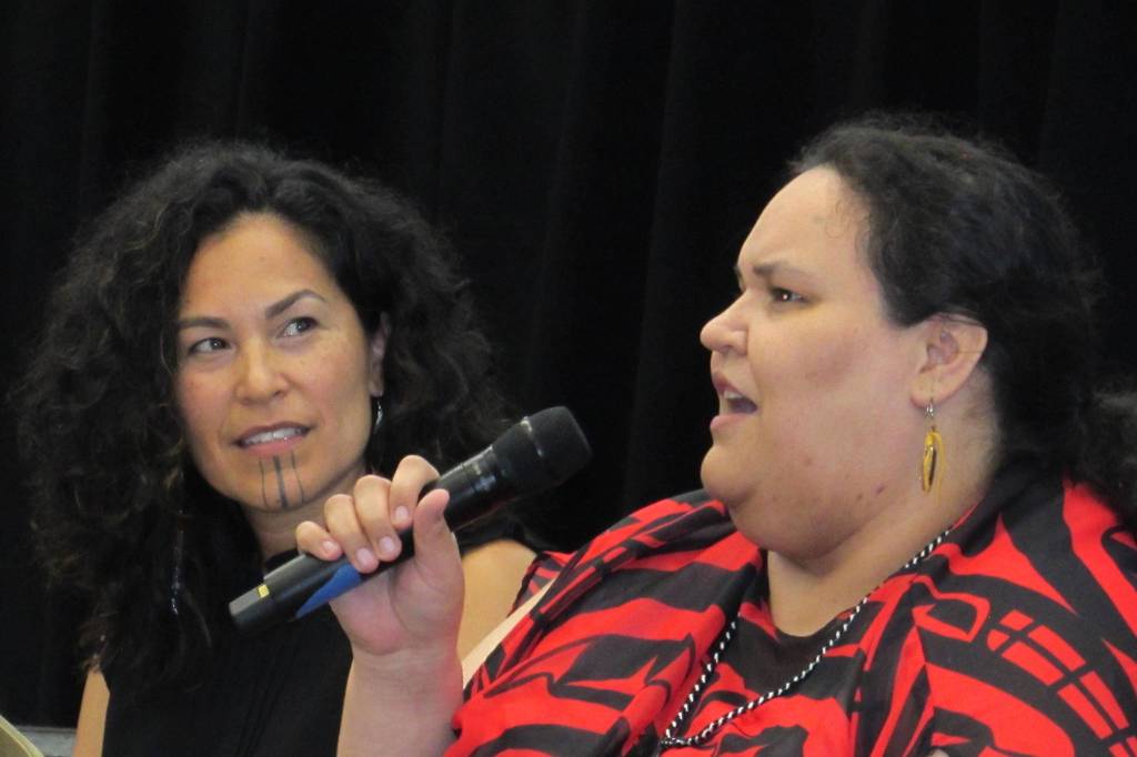 Molly of Denali creative producer Princess Daazhraii Johnson listens to writer Vera Starbard speak during a question-and-answer session at a Molly of Denali screening and celebration Saturday, Aug. 11, 2019.