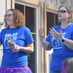Alana Martin and Johna Beech of Kenai Penisula Relay For Life address runners before the start of the Brewery to Bathroom .5K The race for the rest of us on Sunday, Aug. 11, 2019, in Soldotna, Alaska. (Photo by Jeff Helminiak/Peninsula Clarion)