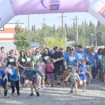 Jeff Helminiak / Peninsula Clarion                                Kids burst from the start of the Brewery to Bathroom .5K The race for the rest of us in Soldotna on Sunday.