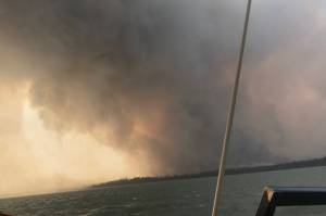 The Swan Lake Fire can be seen here from Skilak Lake on Aug. 19, 2019. (Photo courtesy Marissa Nunooruk)
