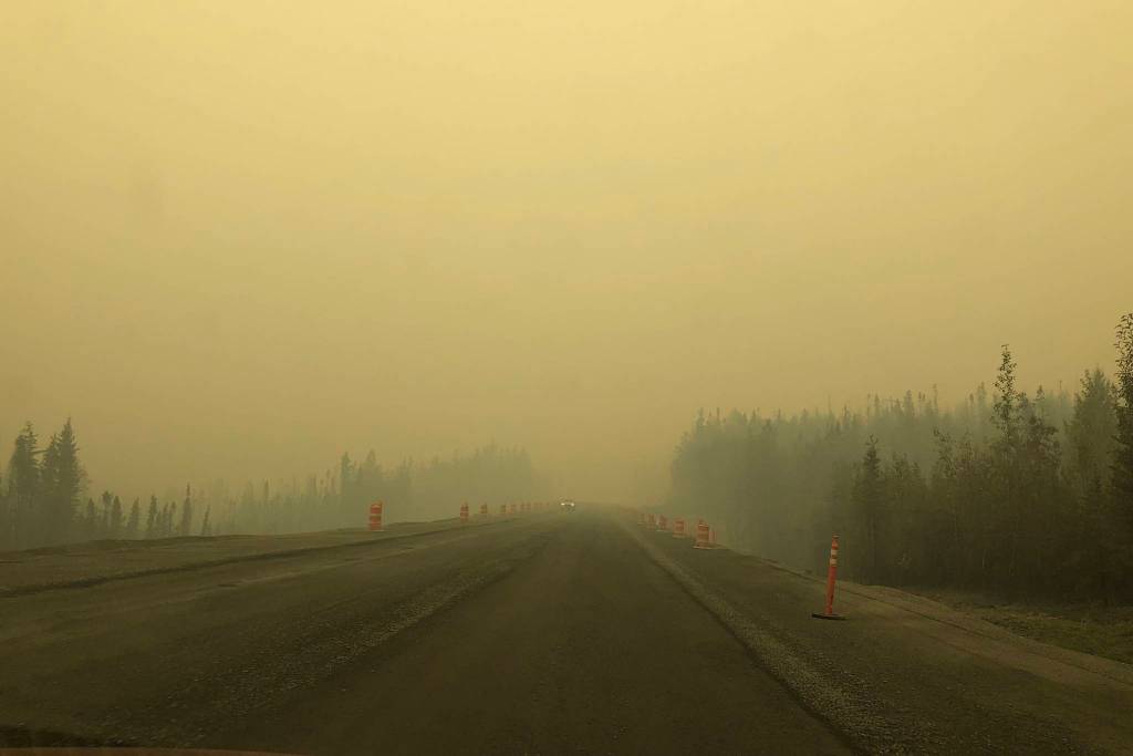 Smoke from the Swan Lake Fire impairs visibility on the Sterling Highway on Aug. 20, 2019. (Photo by Victoria Petersen/Peninsula Clarion)