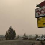 Erin Thompson / Peninsula Clarion                                Haze from Swan Lake Fire smoke can be seen over Kenai National Wildlife Refuge near the corner of the Sterling Highway and Funny River Road on Wednesday in Soldotna.