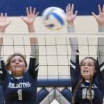 Soldotnas Hosanna Van Hout and Trayce Lyon go up for the block against Nikiski on Thursday, Aug. 29, 2019, at Soldotna High School in Soldotna, Alaska. (Photo by Jeff Helminiak/Peninsula Clarion)