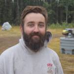 Jacob Mayo, a firefighter from Vale, Oregon, smiles for the camera at the Otter Creek Spike Camp 5 miles north of Sterling, Alaska on Aug. 30, 2019. (Photo by Brian Mazurek/Peninsula Clarion)