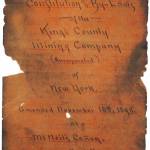 This is the cover page of the Kings County Mining Companys constitution and bylaws, updated on Nov. 10, 1898, at McNeil Canyon, near Homer. (Photo from document in Pratt Museum, Homer)
