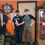 Ammo Can Coffee owner Jason Floyd, left, and his son Liam, right, are seen here at their coffee shop in Soldotna, Alaska on Aug. 16, 2019. (Photo by Brian Mazurek/Peninsula Clarion)