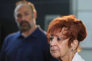 Judy Connolly, mother of murdered teenager Shelley Connolly, spoke to the media after the Alaska State Troopers announced on Tuesday, Sept. 3, 2019, in Anchorage, Alaska, that Oregon resident Donald F. McQuade, 62, has been arrested and charged with murdering Shelley Connolly in the 1978 cold case. She noted it had been 41 years since Shelleys death, which completely altered her familys lives. Shelleys younger brother James Connolly is at left. (Bill Roth/Anchorage Daily News via AP)