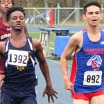 Homers Eyoab Knapp sprints the final stretch of the Division II boys race of the Palmer Invitational. Knapp finished seventh. (Photo by Tim Rockey/Frontiersman)