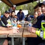 Peninsula residents and firefighters enjoy a meal together during the first responder appreciation barbecue at Soldotna Creek Park on Monday, Sept. 9, 2019, Soldotna, Alaska. (Photo by Brian Mazurek/Peninsula Clarion)