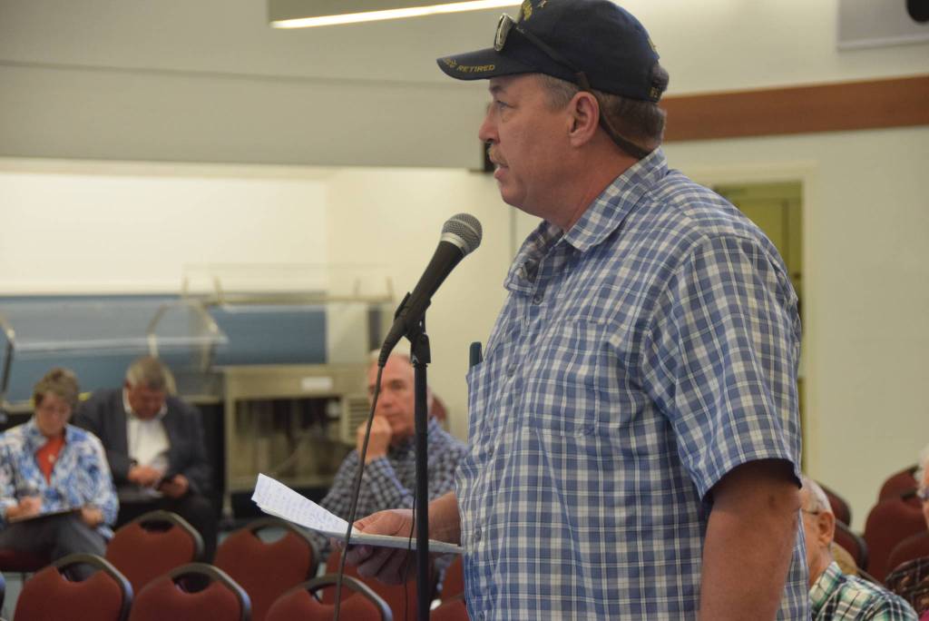 Nikiski resident Paul Huber speaks to members of the Federal Energy Regulatory Commission regarding the Draft Environmental Impact Statement for the Alaska LNG Project at the Nikiski Community Recreation Center on Sept. 11, 2019. (Photo by Brian Mazurek/Peninsula Clarion)