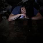 In this Feb. 16, 2019, photo, Deidre Levi rests her head for a moment in her grandmothers house before a basketball game in the Native Village of St. Michael, Alaska. Levi says she spoke up about being sexually assaulted because she wanted to be a role model for girls in Alaska. (AP Photo/Wong Maye-E)
