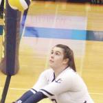 Homers Katlyn Vogl digs the ball out of the net during a volleyball game against Palmer High School on Thursday, Sept. 12, 2019 at the Alice Witte Gymnasium in Homer, Alaska. (Photo by Megan Pacer/Homer News)
