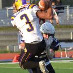 Soldotnas Ray Chumley tackles Lathrop receiver Jhon Rones (3) Friday, Sept. 13, 2019, at Justin Maile Field in Soldotna, Alaska. (Photo by Joey Klecka/Peninsula Clarion)