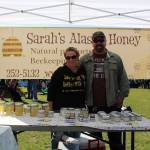 Sarah and Brandon McElrea show off Sarahs Alaska Honey at the Harvest Moon Local Food Festival at Soldotna Creek Park on Sept. 14, 2019. (Photo by Brian Mazurek/Peninsula Clarion)