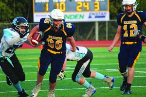 Homers River Mann takes the ball up the field during a Friday, Sept. 13, 2019 football game against Valdez High School on the Mariner field in Homer, Alaska. (Photo by Megan Pacer/Homer News)