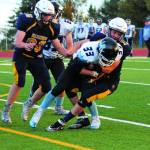 Homers Josh Bradshaw tackles Hayden Howard of Valdez High School during a Friday, Sept. 13, 2019 football game between the two teams at Homer High School in Homer, Alaska. (Photo by Megan Pacer/Homer News)