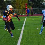 Homers Antonin Murachev runs the ball up the field during a Friday, Sept. 13, 2019 football game against Valdez High School at the Mariner field in Homer, Alaska. (Photo by Megan Pacer/Homer News)