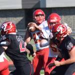 West Valley quarterback Shaun Conwell eyes a receiver downfield Saturday, Sept. 14, 2019, against Kenai Central at Ed Hollier Field in Kenai, Alaska. (Photo by Joey Klecka/Peninsula Clarion)