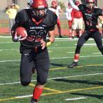 Kenai Central running back Tucker Vann runs the ball in for a touchdown Saturday, Sept. 14, 2019, against West Valley at Ed Hollier Field in Kenai, Alaska. (Photo by Joey Klecka/Peninsula Clarion)