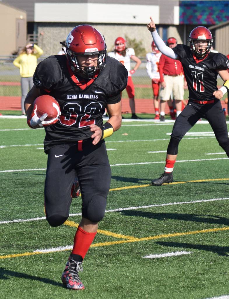 Kenai Central running back Tucker Vann runs the ball in for a touchdown Saturday, Sept. 14, 2019, against West Valley at Ed Hollier Field in Kenai, Alaska. (Photo by Joey Klecka/Peninsula Clarion)