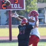 West Valley receiver Tyriq Nance hauls in a reception over Kenai Central defender Zach Burnett, Saturday, Sept. 14, 2019, at Ed Hollier Field in Kenai, Alaska. (Photo by Joey Klecka/Peninsula Clarion)