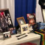 story and photo by Victoria Petersen / Peninsula Clarion                                Memorabilia belonging to the late Dr. John Nels Anderson, who was serving as Soldotnas Mayor, were on display Monday at the Soldotna Regional Sports Complex during a community memorial service.