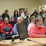 Frtiz Creek area resident Barrett Fletcher gives the invocation before a Tuesday, Sept. 17, 2019 Kenai Peninsula Borough Assembly meeting as a representative of the Church of the Flying Spaghetti Monster at Homer City Hall in Homer, Alaska. (Photo by Megan Pacer/Homer News)