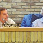 Kenai City Council Members Henry Knackstedt, left, and Bob Molloy, right, listen to public comments during the Kenai City Council Meeting on Wednesday, Sept. 18, 2019. (Photo by Brian Mazurek/Peninsula Clarion)