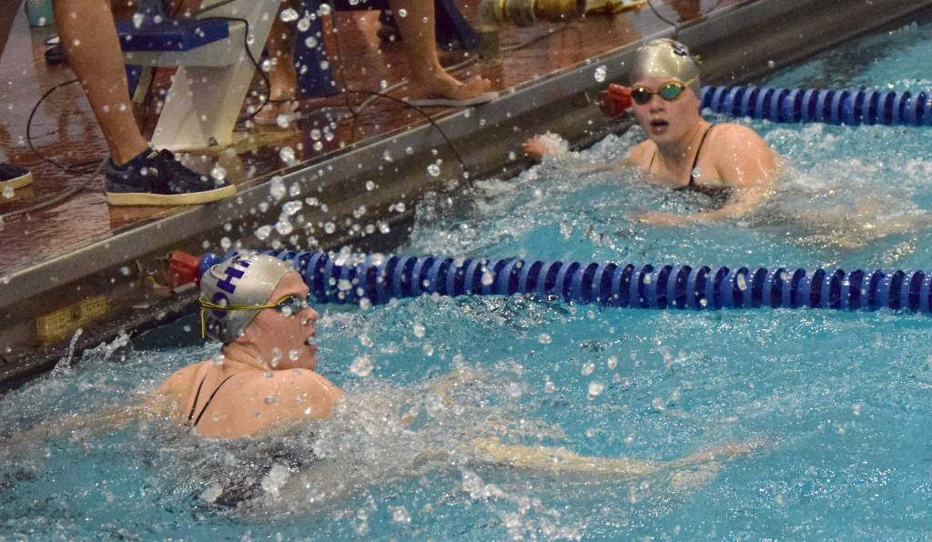 Soldotna High Schools Madison Snyder and Katie Creglow touch the wall in the 50-yard freestyle Friday, Sept. 20, 2019, in the 2019 SoHi Pentathlon at Soldotna High School in Soldotna, Alaska. (Photo by Jeff Helminiak/Peninsula Clarion)