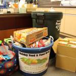 Some of the food collected through the Foods for Fines program at the Soldotna Public Library can be seen here on Sept. 20, 2019. (Photo by Brian Mazurek/Peninsula Clarion)