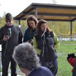 Kaitlin Vadla of Cook Inletkeeper leads the Climate Strike participants in a song before heading down the Sterling Highway during Soldotnas Climate Strike on Sept. 20, 2019. (Photo by Brian Mazurek/Peninsula Clarion)