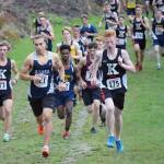 Kenai Centrals Maison Dunham (173), Soldotnas Bradley Walters and Kenais Joe Hamilton lead the boys varsity field at the start of the Kenai Peninsula Borough cross-country meet Saturday at Tsalteshi Trails. (Photo by Jeff Helminiak/Peninsula Clarion)