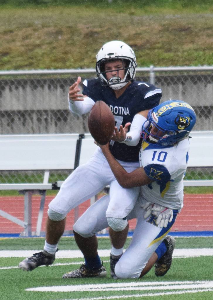 Soldotnas Wyatt Medcoff nearly comes down with an interception in front of Kodiaks Justin Doctolero, Saturday, Sept. 21, 2019, at Justin Maile Field in Soldotna, Alaska. (Photo by Joey Klecka/Peninsula Clarion)