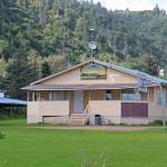 Megan Pacer / Homer News                                The Kachemak Selo Middle-High School building sits against a backdrop of the ridge separating the village from the Kenai Peninsula Borough road system.