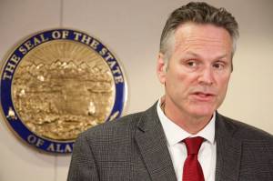Alaska Gov. Mike Dunleavy announces the nomination of state Rep. Josh Revak to an open state Senate seat during a news conference Friday, Sept. 27, 2019, in Anchorage, Alaska. Dunleavys first choice for the seat, Rep. Laddie Shaw, was rejected by Senate Republicans, who now will consider Revaks nomination. (AP Photo/Mark Thiessen)