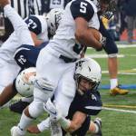 Soldotnas Jersey Truesdell (bottom) tackles Eagle Rivers Cashiez Reaves, Saturday, Sept. 28, 2019, against Eagle River at Justin Maile Field in Soldotna. (Photo by Joey Klecka/Peninsula Clarion)
