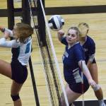 Soldotnas Bailey Armstrong deflects a ball from Nikiskis Kaitlyn Johnson, Tuesday, Oct. 1, 2019, at Nikiski High School in Nikiski, Alaska. (Photo by Joey Klecka/Peninsula Clarion)