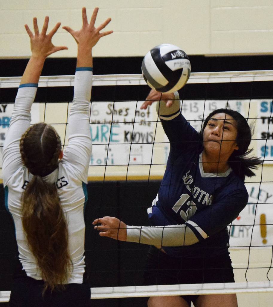 Soldotnas Ituau Tuisaula (right) sends a ball past Nikiskis Kaitlyn Johnson Tuesday, Oct. 1, 2019, at Nikiski High School in Nikiski, Alaska. (Photo by Joey Klecka/Peninsula Clarion)