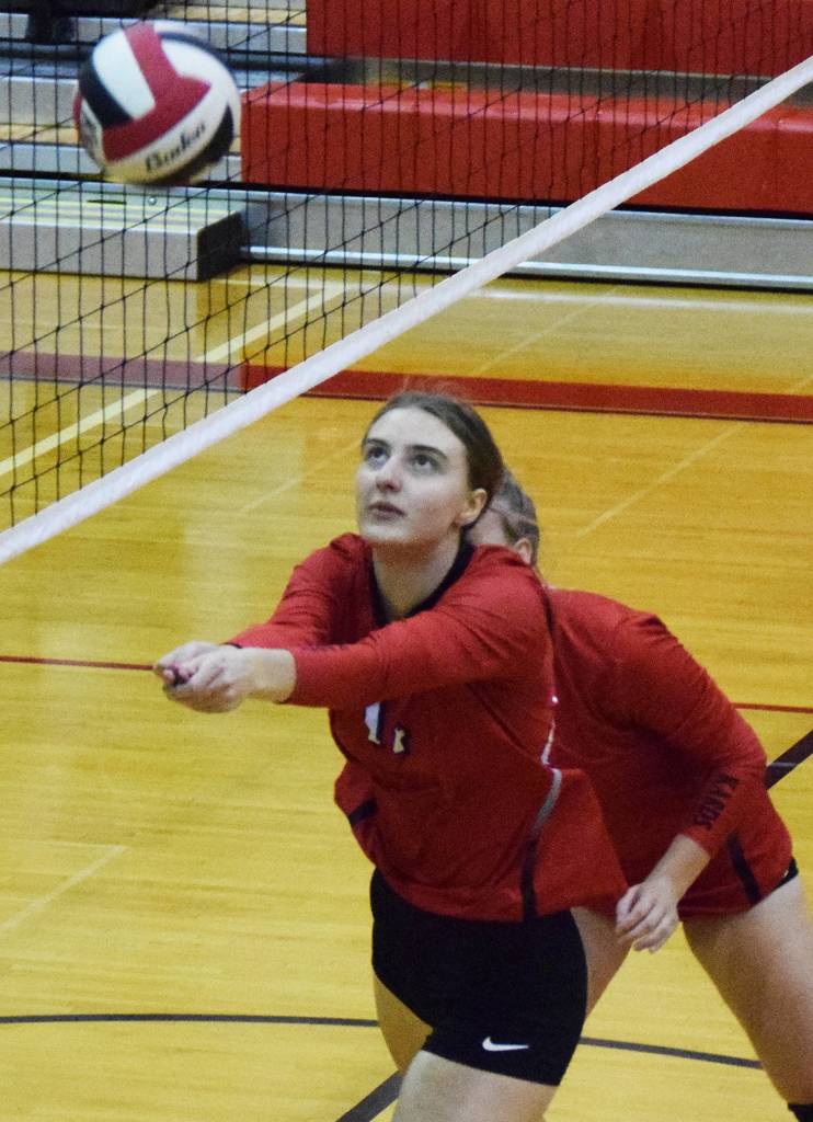 Kenais Erin Koziczkowski sets the ball Thursday, Oct. 3, 2019, against Seward at Kenai Central High School in Kenai, Alaska. (Photo by Joey Klecka/Peninsula Clarion)