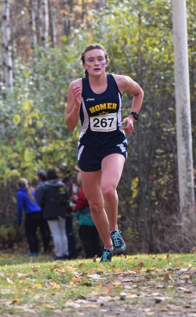 Homers Autumn Daigle leads the field at the Div. II girls state cross-country championships Saturday, Oct. 5, 2019, on the Bartlett High trails in Anchorage, Alaska. (Photo by Joey Klecka/Peninsula Clarion)