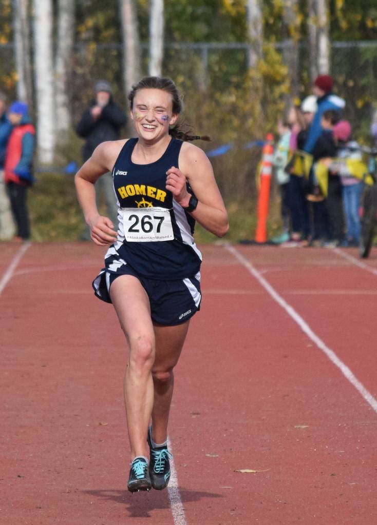 Homers Autumn Daigle approaches the finish to win the Div. II girls state cross-country championship Saturday, Oct. 5, 2019, on the Bartlett High trails in Anchorage, Alaska. (Photo by Joey Klecka/Peninsula Clarion)