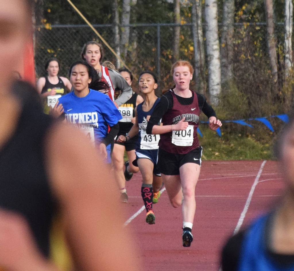 Nikolaevsks Isabella Hickman approaches the finish of the Div. III girls state cross-country championships Saturday, Oct. 5, 2019, on the Bartlett High trails in Anchorage, Alaska. (Photo by Joey Klecka/Peninsula Clarion)
